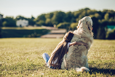 Immagine di bambina con cane